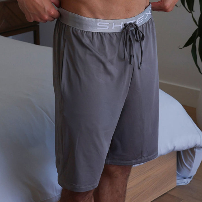 Model wearing SHEEX Men's Lounge Short in Graphite #choose-your-color_graphite