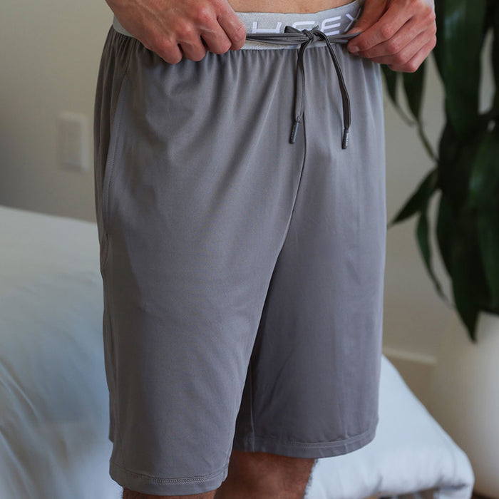Model wearing SHEEX Men's Lounge Short in Graphite #choose-your-color_graphite