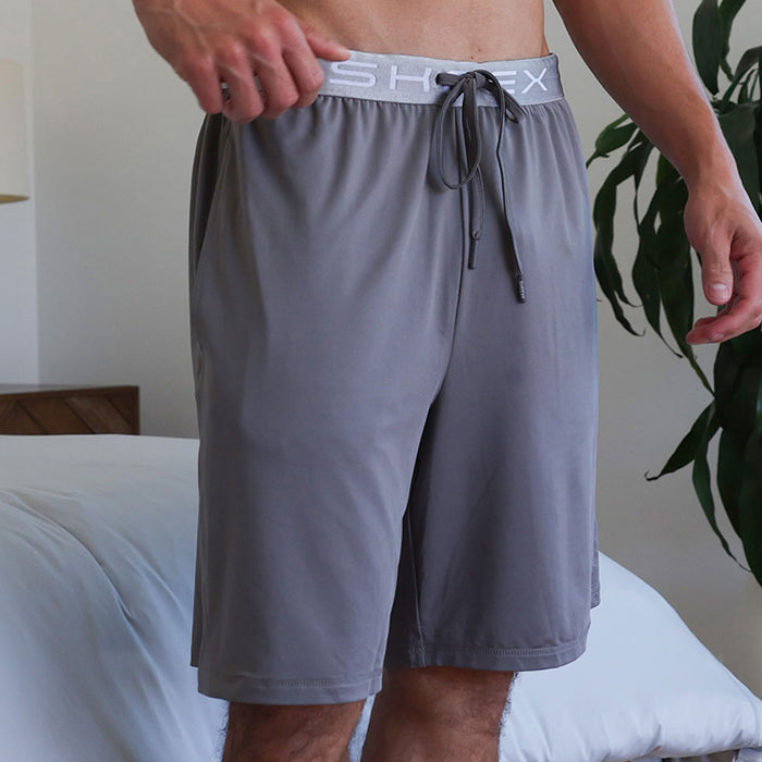 Model wearing SHEEX Men's Lounge Short in Graphite #choose-your-color_graphite